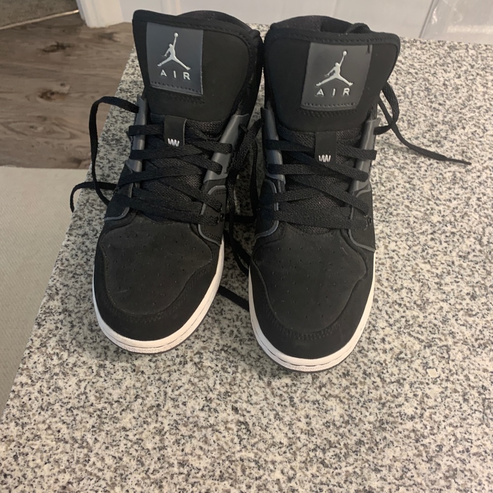 Brand new Jordan’s size 5y black w white. Suede